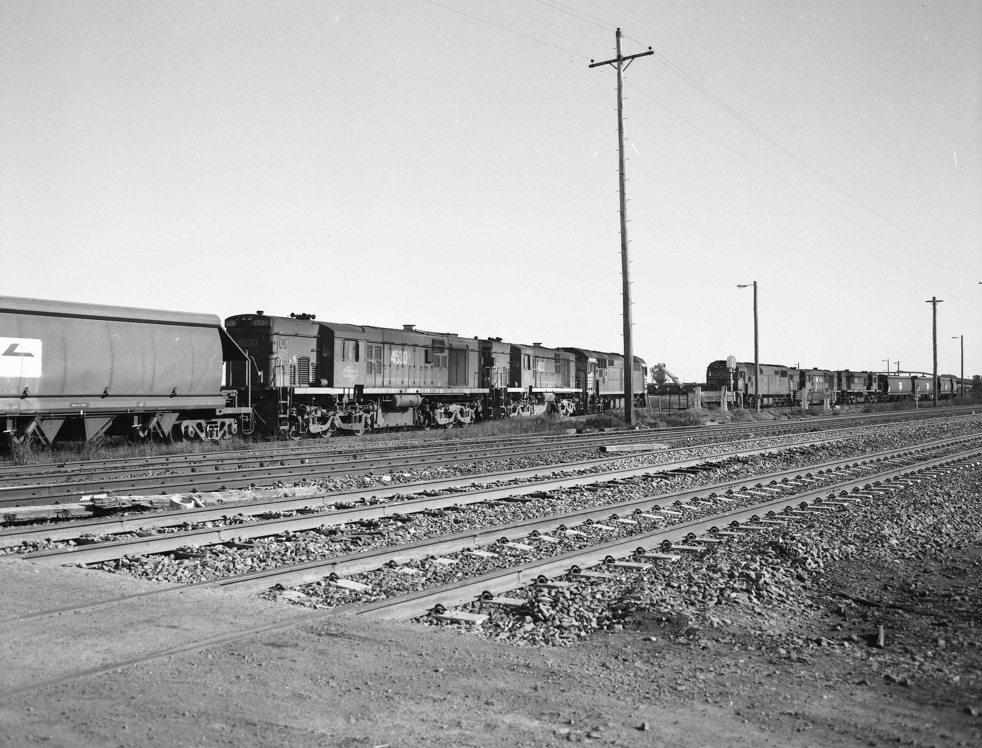Two trains crossing at entrance to Hexham Balloon Loop, Hexham, NSW, 22 ...