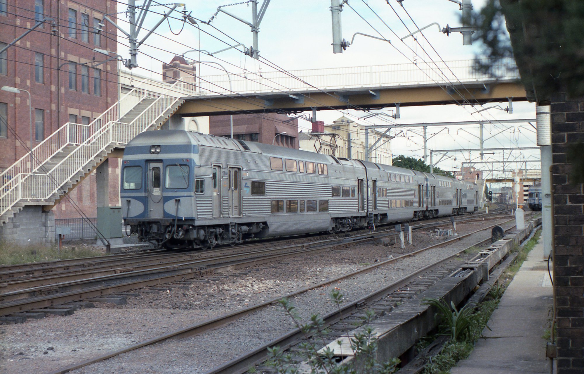 A V set departs Newcastle while another waits in Dark's siding | Living ...