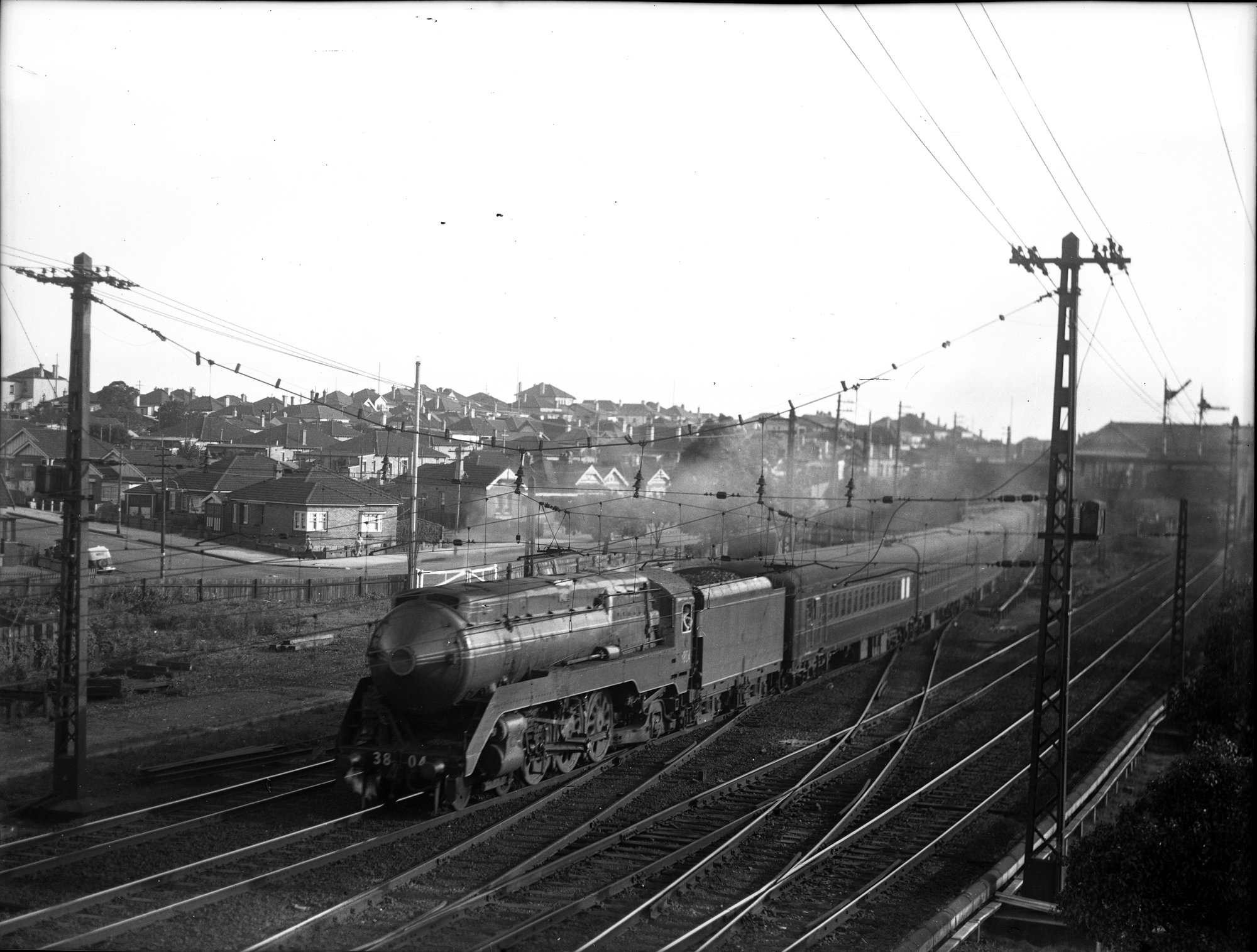 NSWGR C38, no. 3804, hauling passenger train through suburbs, post-1945 ...