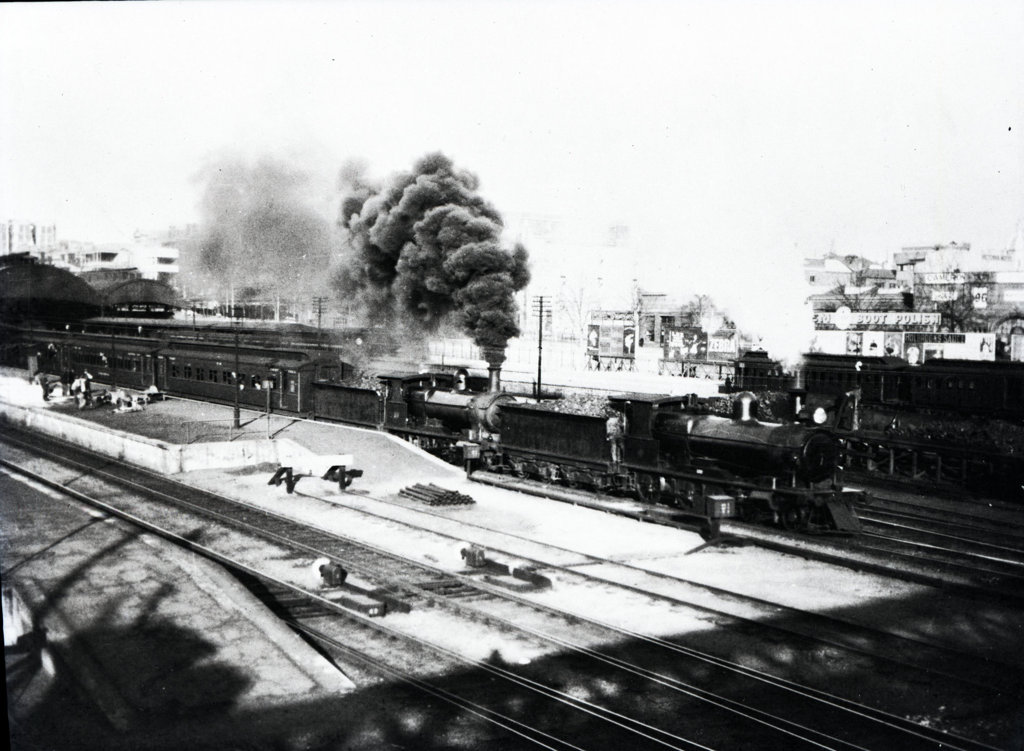 SAR Rx class locomotives, hauling a passenger train out of a station ...