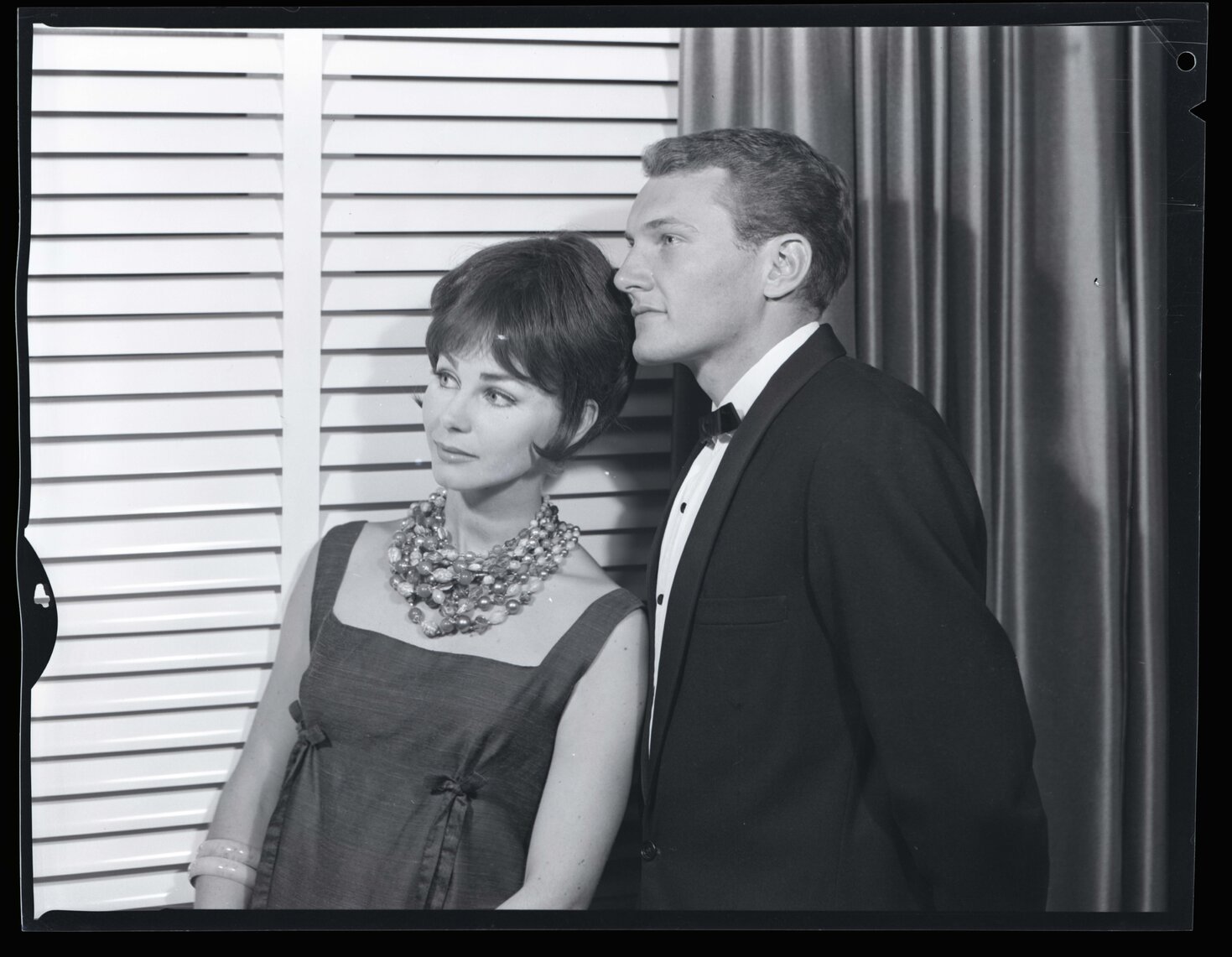 Location shot with models in formal wear, 1965 | Living Histories
