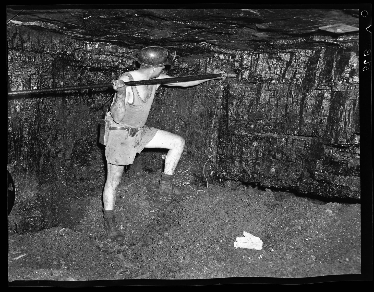 Miner in underground shaft | Living Histories