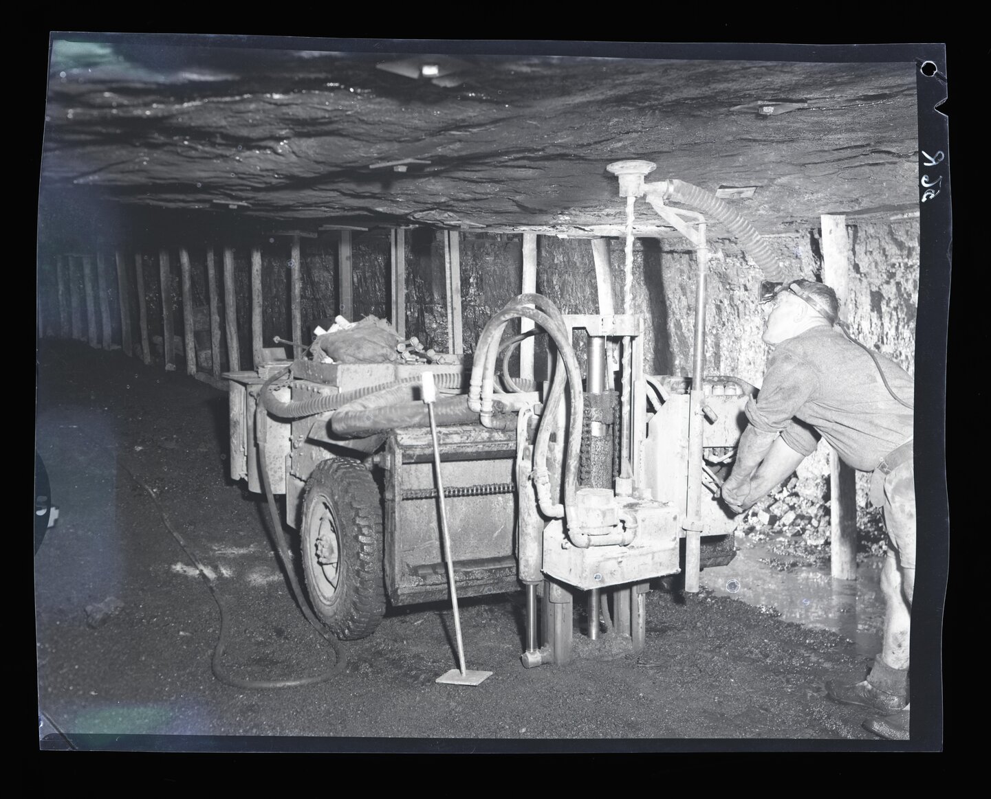 Miner operating machinery | Living Histories