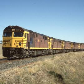 8036 and four 80 Class, freight train, Manildra, NSW, 19 April 1994