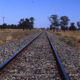 Wheat train in distance, Fairview, NSW, 29 January 1987