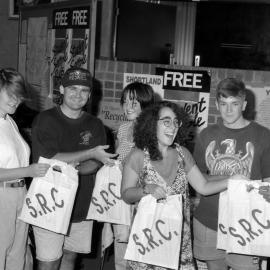Ms. Tina Bubutievski (SRC) with unidentified enrolling students, the University of Newcastle, Australia - 1992
