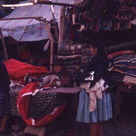 Seamstress, Cuzco market, [1960]