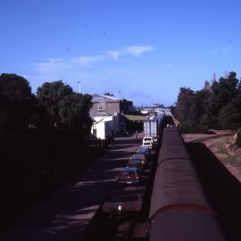 Cars loaded onto wagons on the Ghan, Port Augusta, SA, [1978]