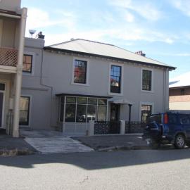 Two story building next to terrace buildings, Newcastle, NSW, 27 February 2010