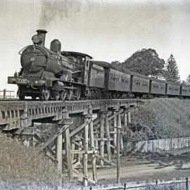NSWGR C32 Class, No. 3380, 4-6-0 Ten-wheeler Type express passenger locomotive on a passenger service departing Kiama [1930s]