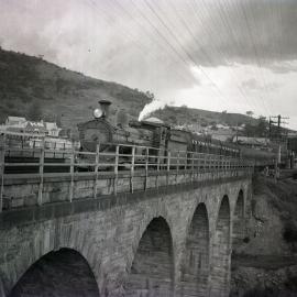 NSWGR C32 Class, No. 3311, 4-6-0 Ten-wheeler Type, express passenger locomotive on south-bound passenger departing Picton, [1930]