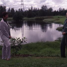 Cathy Tate, (Lady Mayoress), and Paddy Lightfoot plant 30,000th tree, Ficus rubiginosa, Rusty Fig, or Port Jackson Fig), Shortland Wetlands, 1985-2004