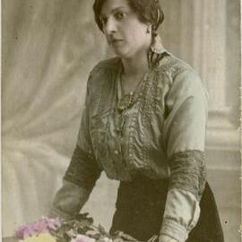 Postcard of a woman with flowers