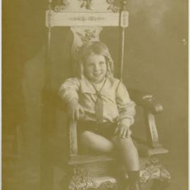 Portrait of small girl on throne