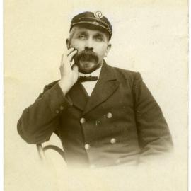 Unidentified man in nautical hat.