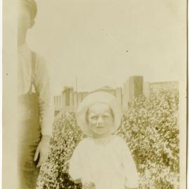 Photo of unidentified man and small child.