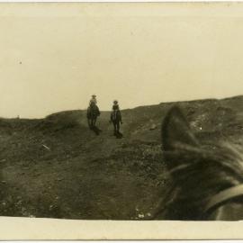 Photo of riders from atop a horse