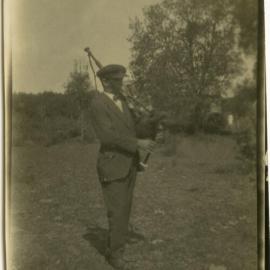 Portrait of man with bagpipes