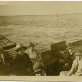Group portrait at sea, unidentified persons