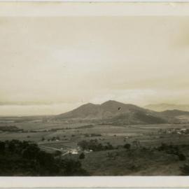 Landscape with mountain and fields, possibly near Cairns