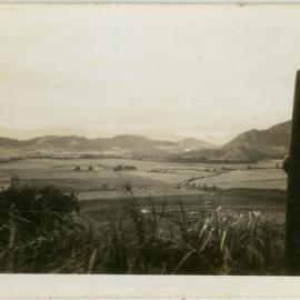 Landscape of fields and mountains near Cairns