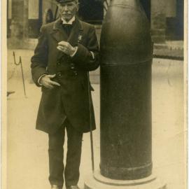 Man and artillery shell