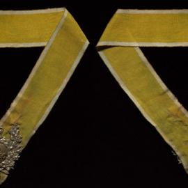 Yellow collar regalia with Sec. [Secretary]