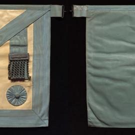 White and Blue masonic apron with rosettes, J M Fraser