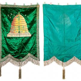 Green lodge banner with yellow beehive print