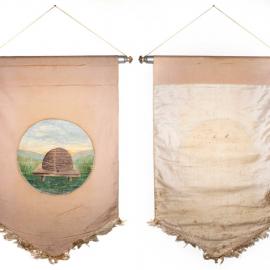 Lodge banner with print of beehive in a field