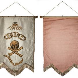 Lodge banner with gold print of skull and crossbones, all seeing eye and chain links with FLT