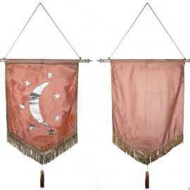 Peach lodge banner with fringing, and crescent moon and stars print