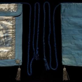GUOOF Committee of Management, white and blue apron with ornate silver detail