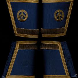 Blue gauntlets, metallic gold detail, square, level and plumb