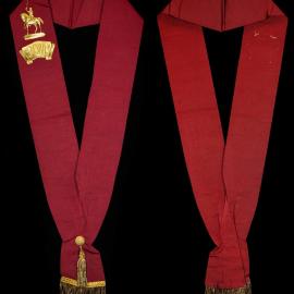 Red masonic sash with K.O.M.
