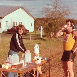 Sue Beisty at race drink stop - 1980s