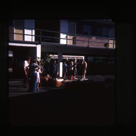 Newcastle Siberian Cossacks waiting to board bus, NSW, 1983