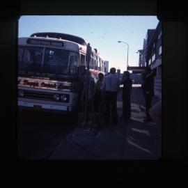 Newcastle Siberian Cossacks boarding bus, NSW, 1983