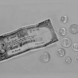 Ten pound note and coins