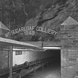 "Mt. Sugarloaf Colliery 1949" entrance signage, West Wallsend, NSW, 1959