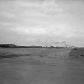 New site for Titan Manufacturing in the distance, Mayfield, NSW, 1958