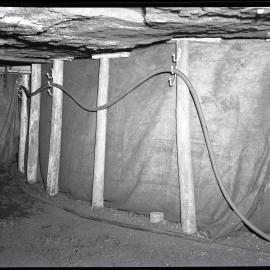 Underground cable and pit props, Burwood [No 3] Colliery, Whitebridge, NSW,  1957