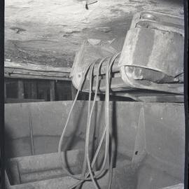 Underground cables hanging from conveyer, Burwood [No 3] Colliery, Whitebridge, NSW,  1957