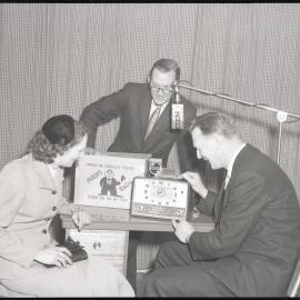 Woman presented with a Philips clock radio at 2HD Radio promotion, Hamilton, NSW
