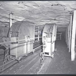 Coalcliff Colliery, two wire pulleys on tracks underground, NSW, 1959
