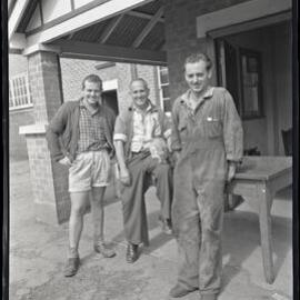 Three men and cat at [Belmont Sports Club], NSW, 1962