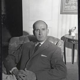 [Mr E Rayfield], in living room, NSW, 1961