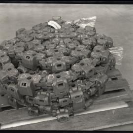 Industrial chain rolled up on pallet, 1963