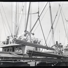 Loading steel on cargo ship, upper deck, 1964