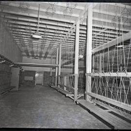 Factory room with wood benches and cords